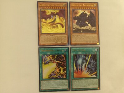 SLIFER THE SKY DRAGON OBELISK THE TORMENTOR THUNDERFORCE ATTACK FIST OF FATE YGO-image