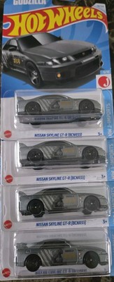 Nissan Skyline GT-R (BCNR33) R33 Hot Wheels GodZilla Case N LOT OF 4-image