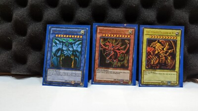 YuGiOh GOD CARDS:🔥OBELISK TORMENTOR ▪️ SLIFER SKY DRAGON ▪️ WINGED DRAGON RA🔥-image